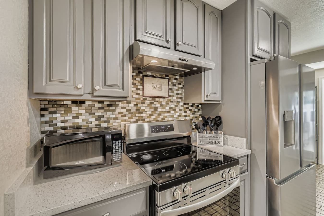 Whip up something delicious in this clean, functional kitchen.