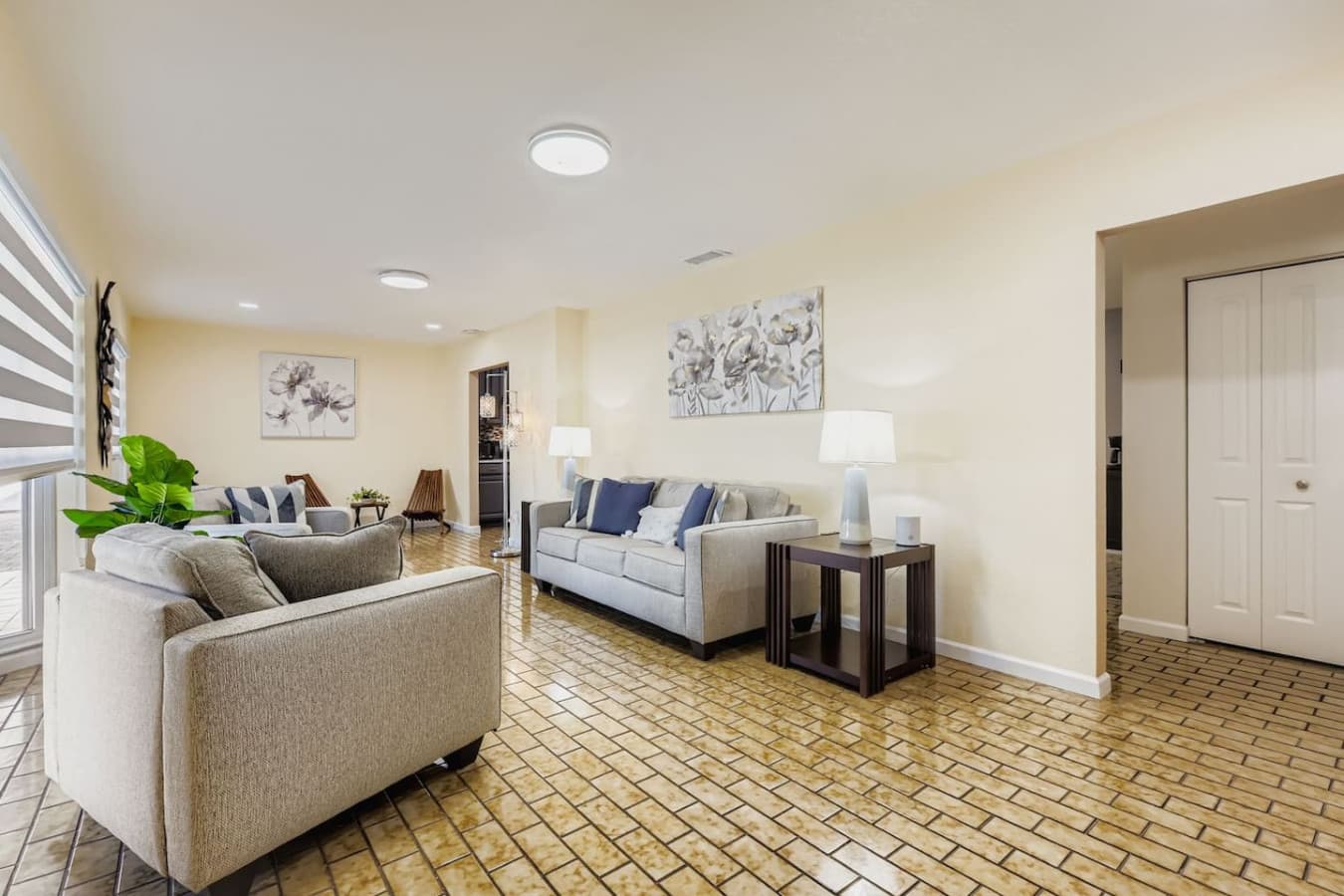 Kick back in our cozy living room, featuring plush seating, soft lighting, and a calming aesthetic.
