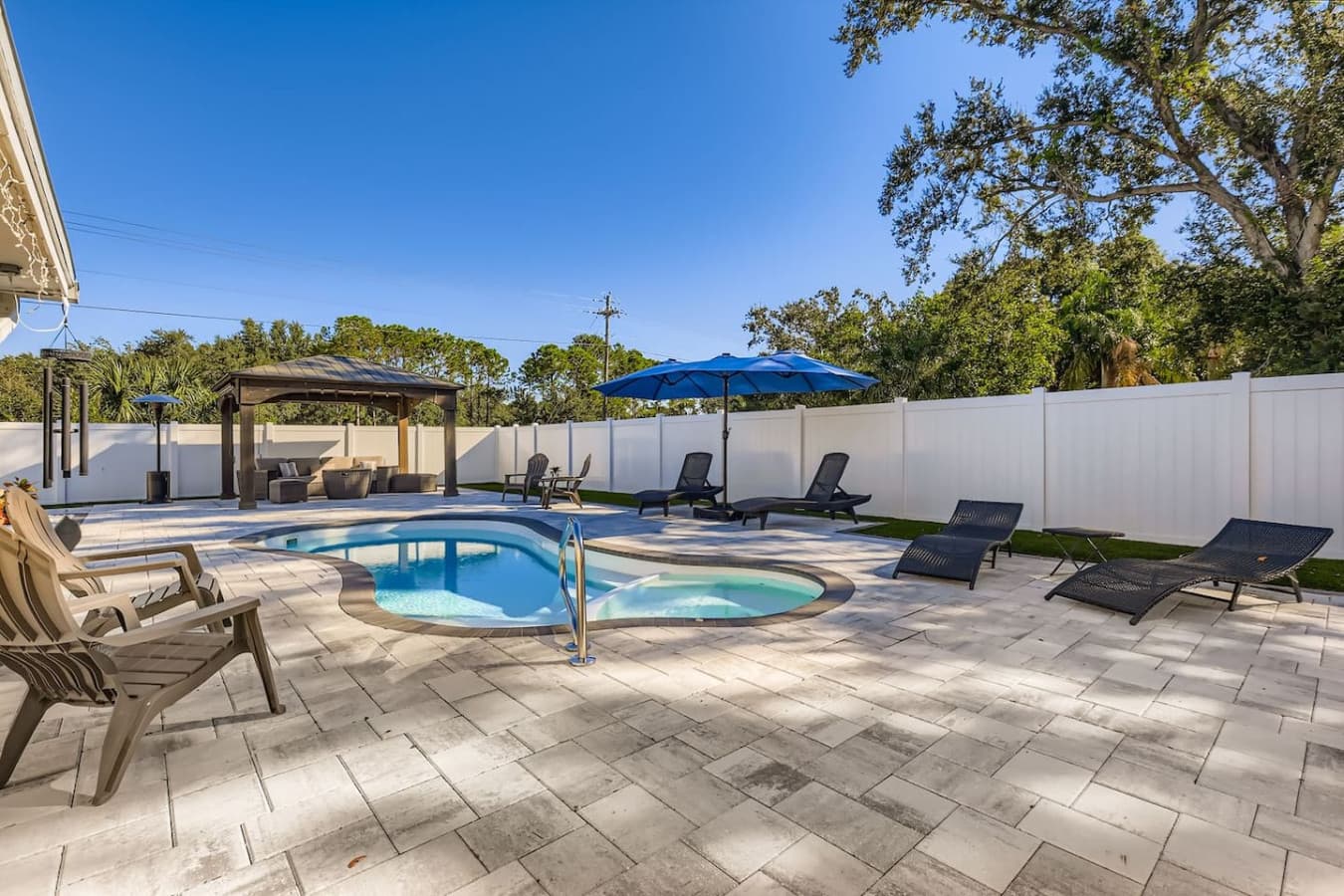 Soak up the sun in style, this serene pool comes with loungers, umbrellas, and total privacy.