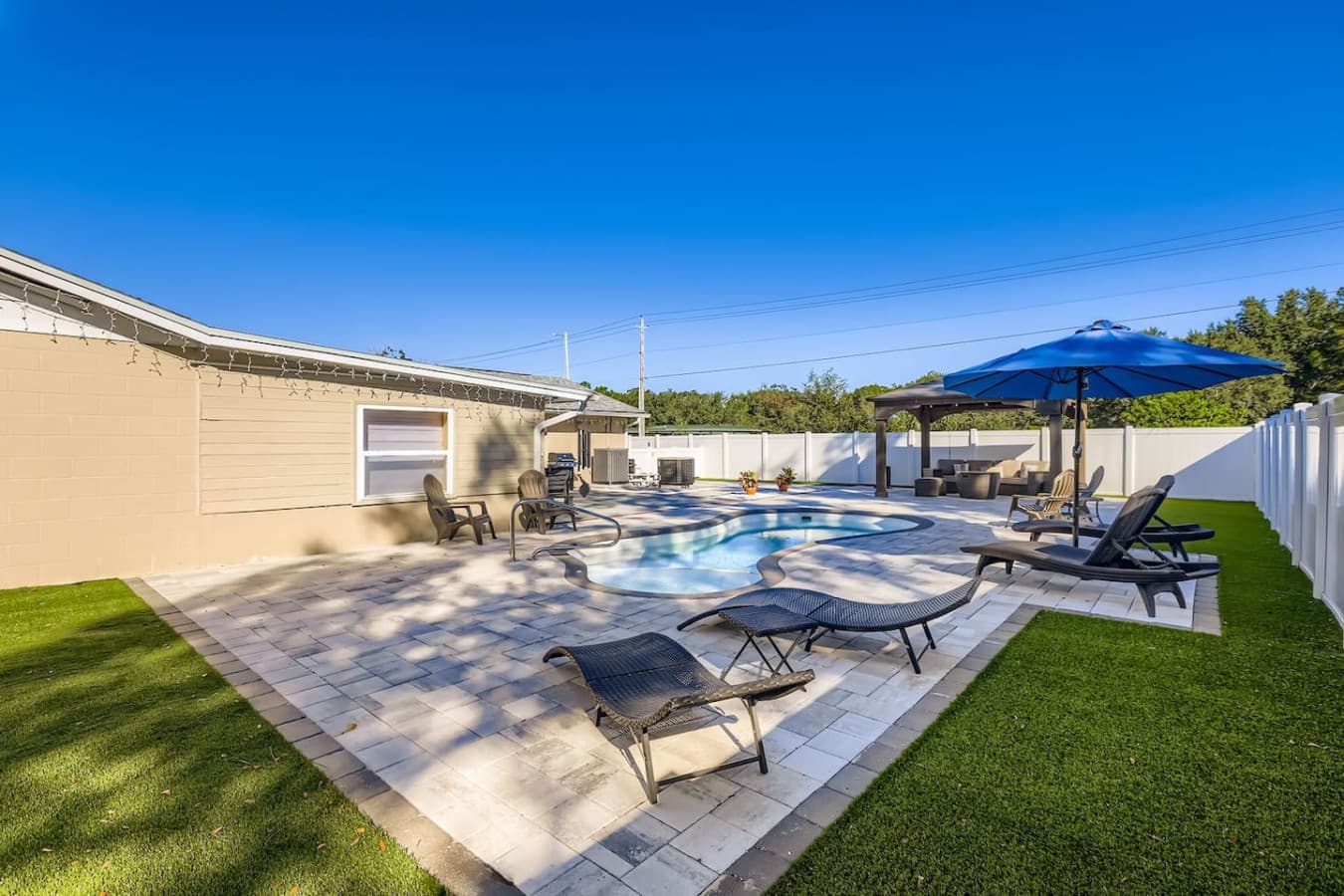 Dine poolside or fire up the grill, enjoy meals outdoors just steps from the water, with plenty of seating for your whole group.