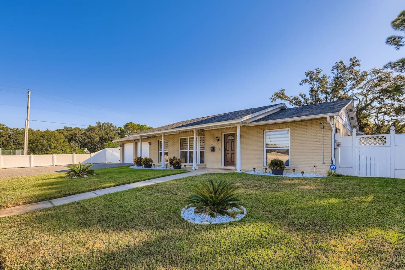 Stretch out and enjoy the open lawn, mature trees, and quiet neighborhood surroundings.