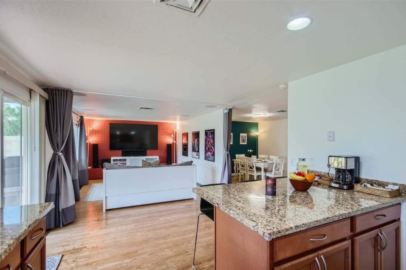 Media Room located on the main level is the perfect space to unwind with family and friends.