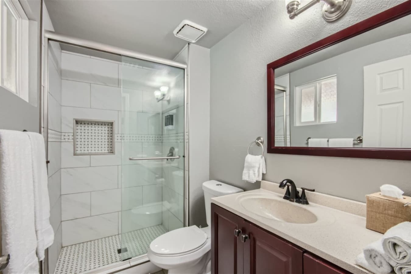 En-suite master bathroom featured on the main level with a step in shower.