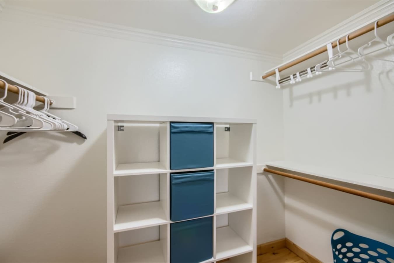 Walk in closet featured in bedroom one.