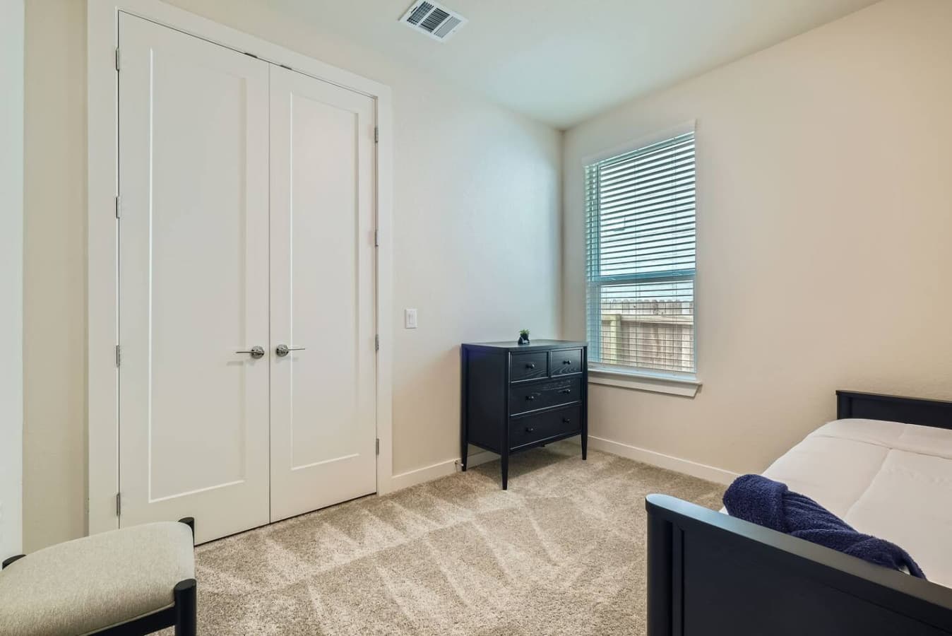 Clothing storage in the fourth bedroom.