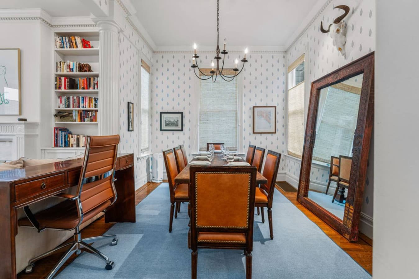 Dining area with a dedicated workspace.