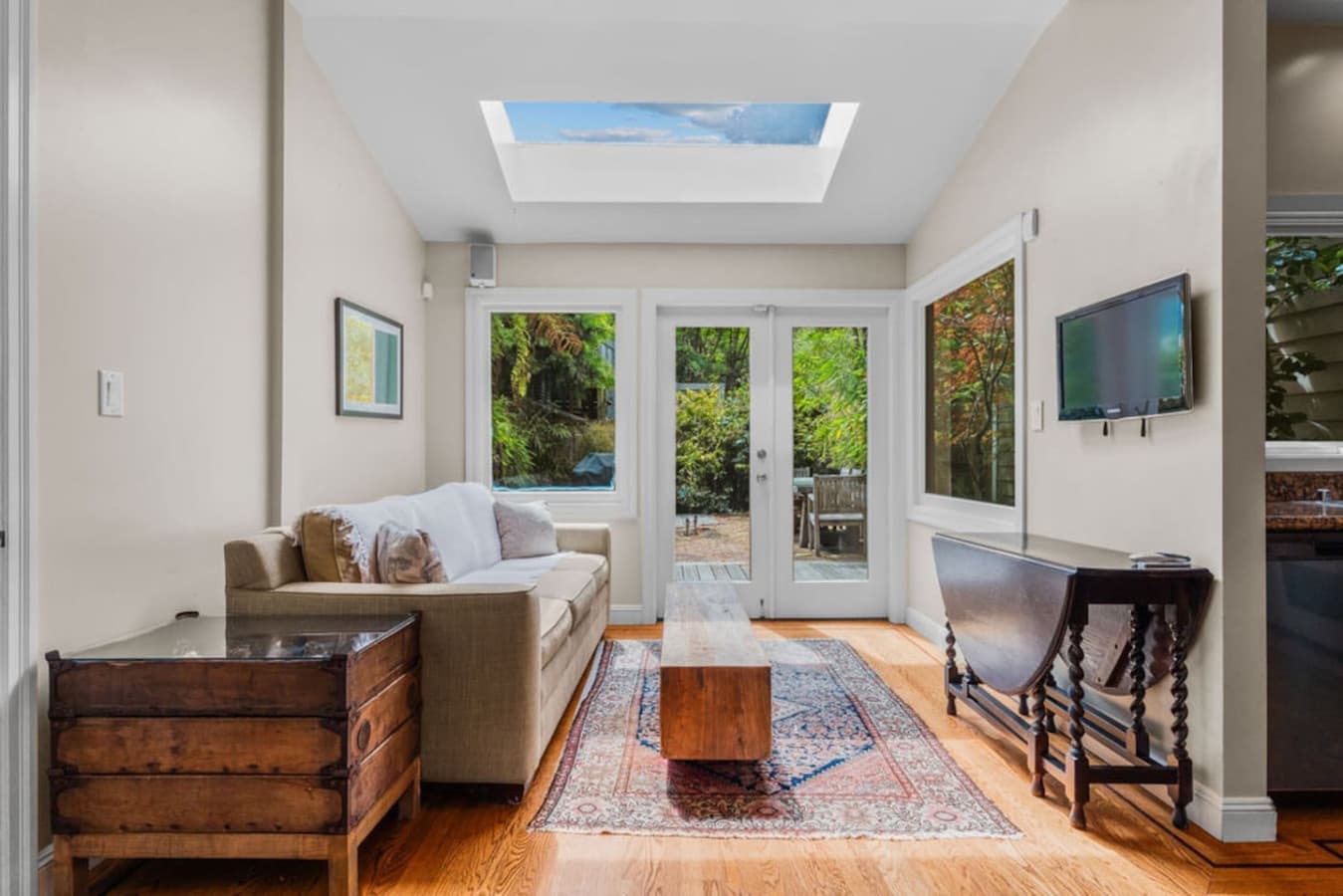 Spacious living area with access to the backyard.