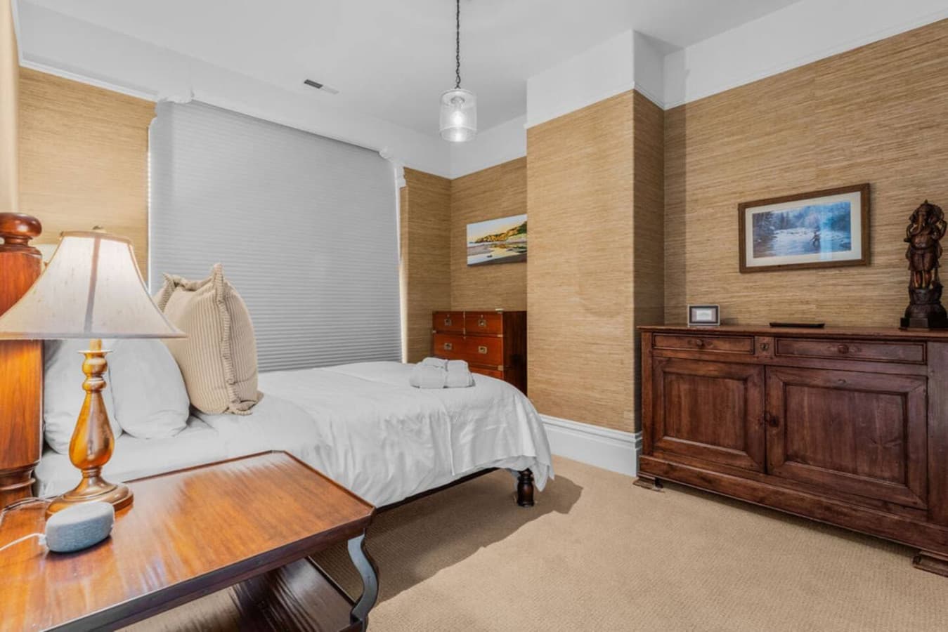 Master bedroom with a king size bed.