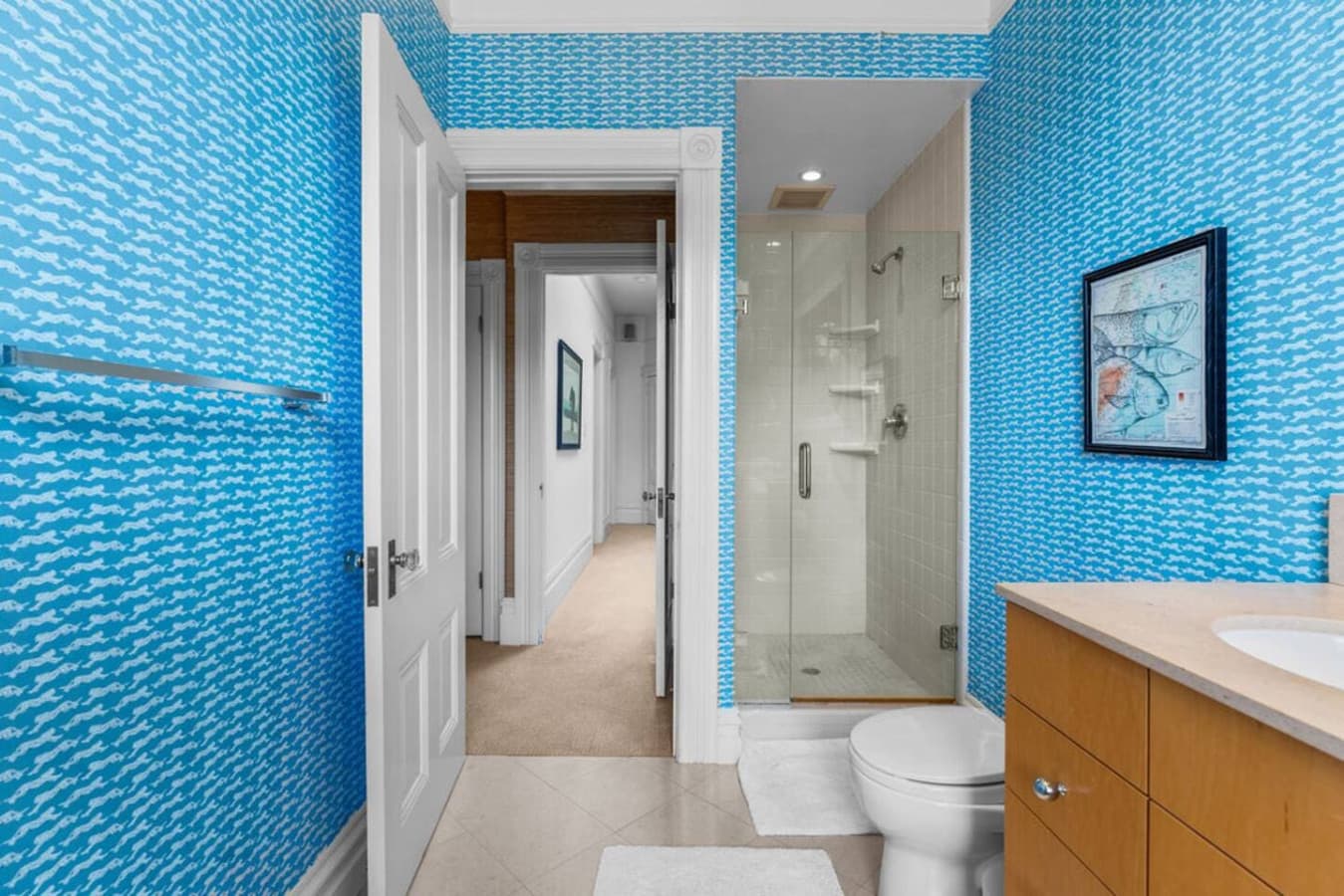 Full bathroom with a walk-in shower.