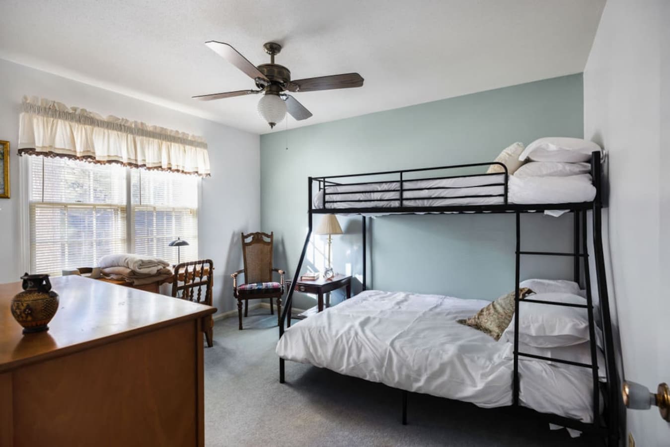 A spacious bunk room offering room for families or groups.