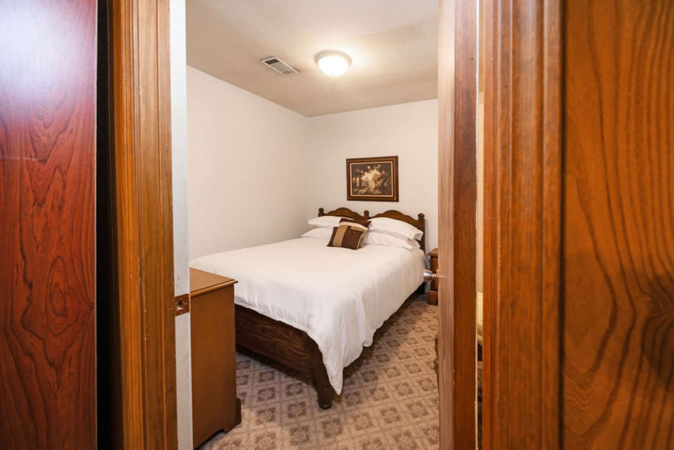 A simple and peaceful room perfect for a restful night.