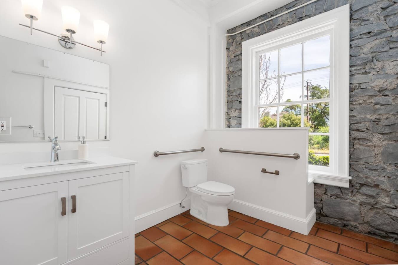 This is the private bathroom inside the room you will be renting offering bright, clean finishes and a comfortable layout.