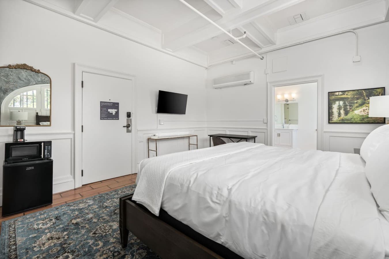 This is the private room you will be renting with clean finishes, a king bed, and direct access to your private bathroom.
