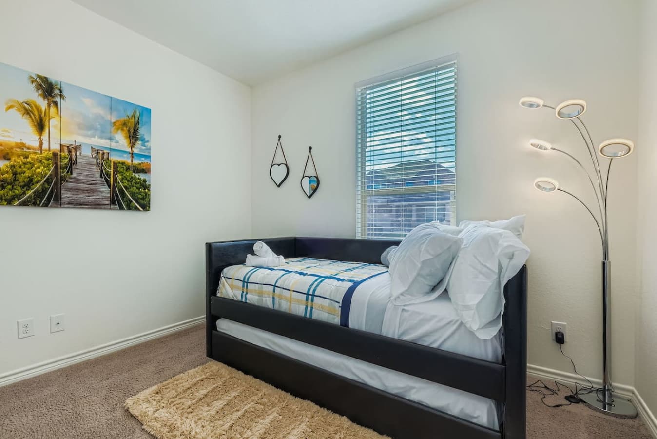 Single and pull out trundle bed in the fifth bedroom.