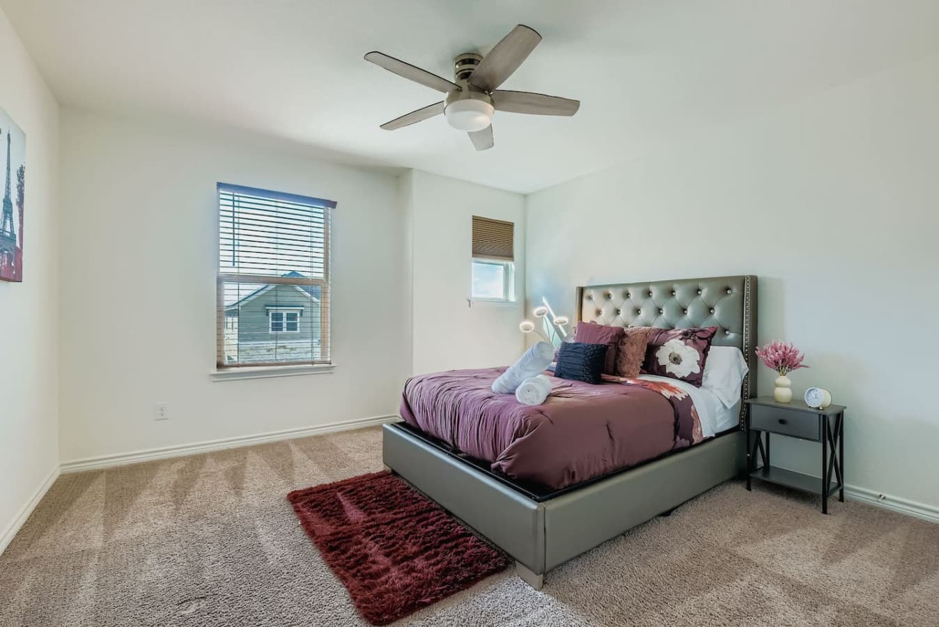 Queen size bed in the second bedroom.