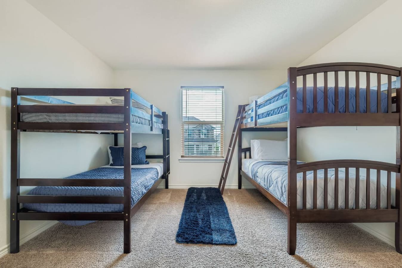 Two sets of bunk beds in the fourth bedroom.