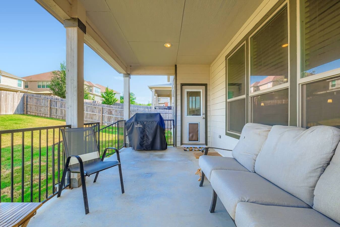 Comfortable seating on the patio in the backyard.