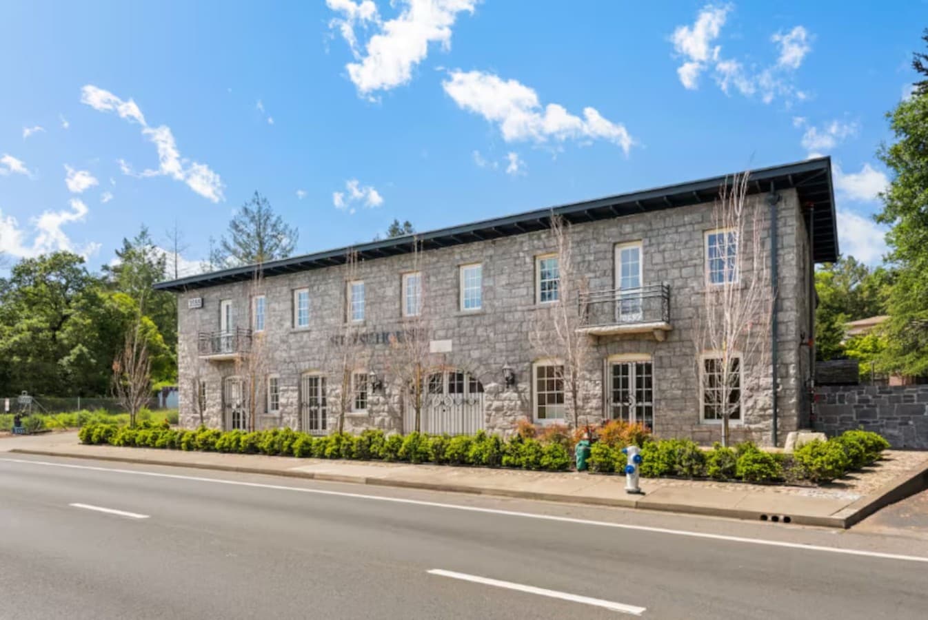 A full street-view perspective of the hotel showcasing its classic architecture and welcoming presence.