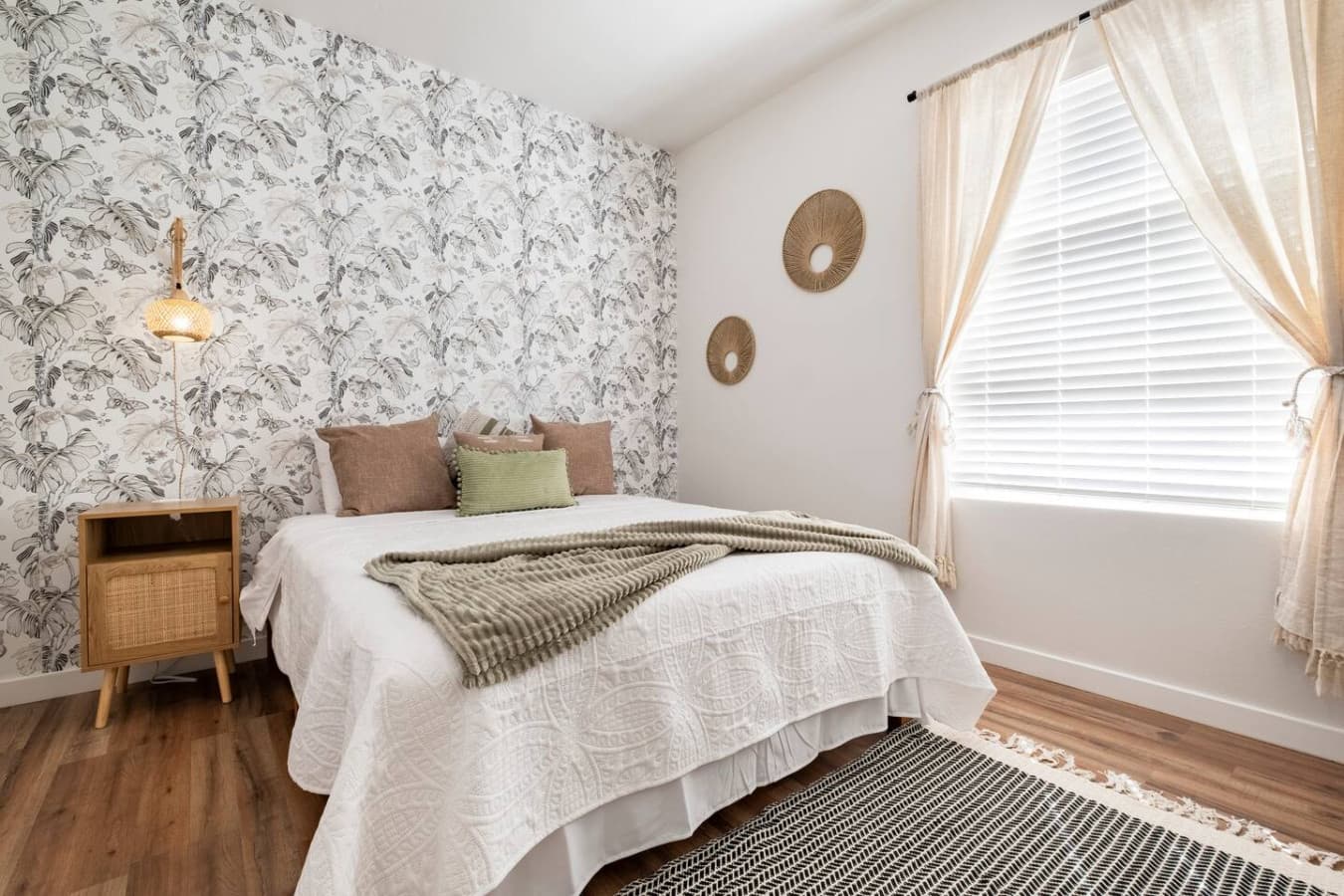 Queen size bed in the master bedroom.