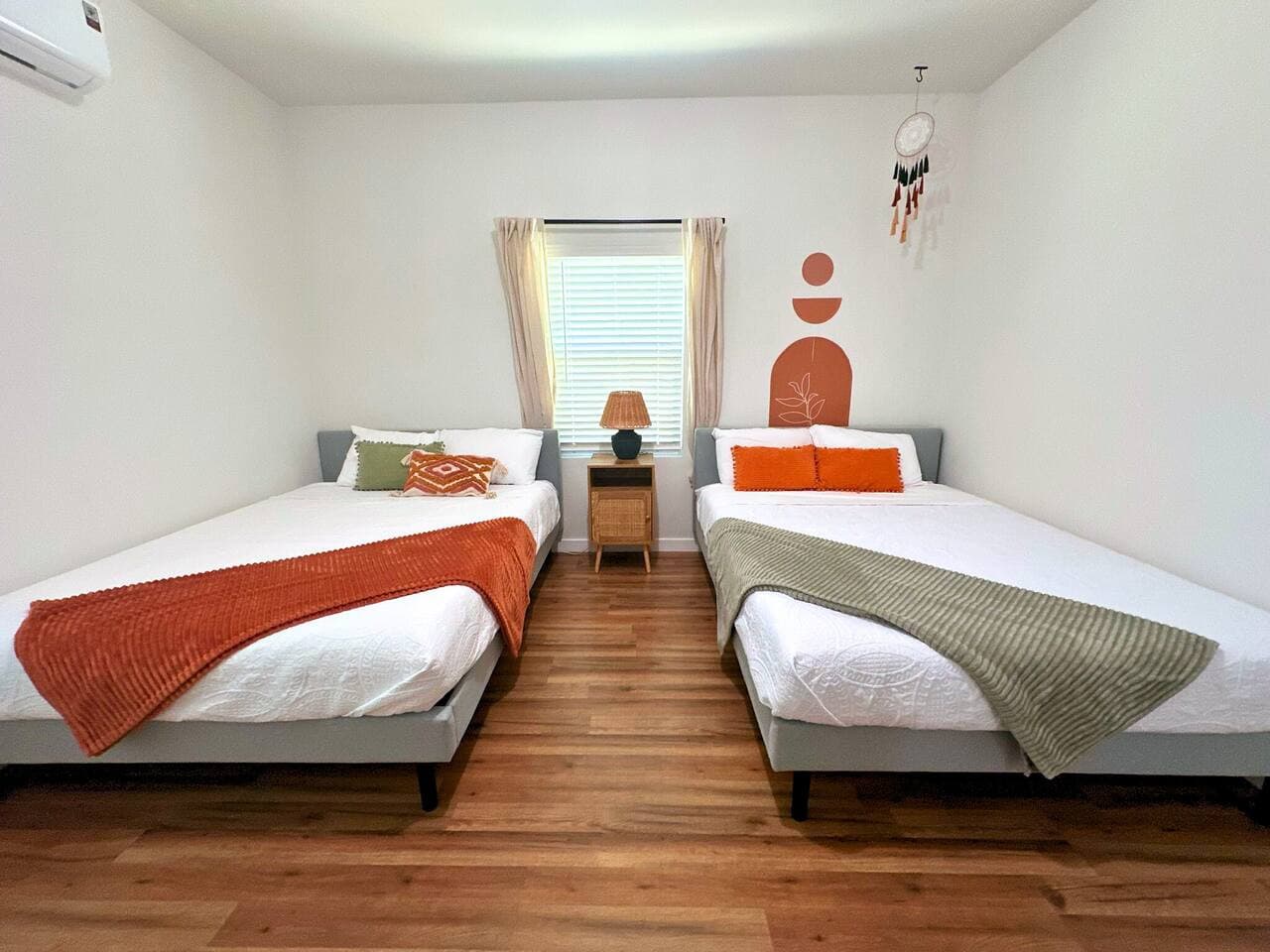 Queen and single size beds in the third bedroom.