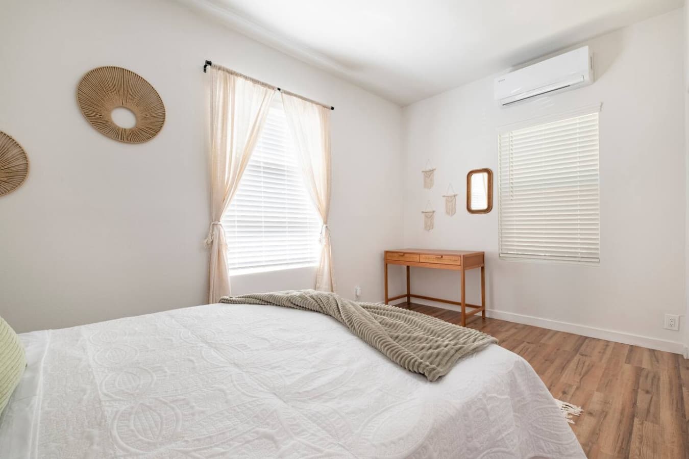Dedicated workspace and an individual split AC unit in the master bedroom.
