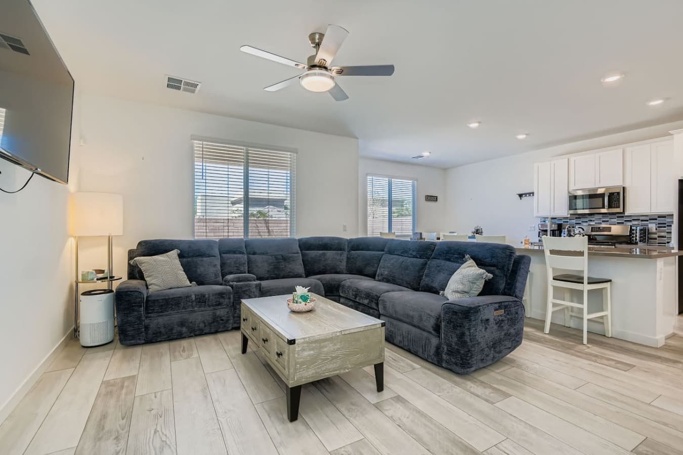 Living room area with a cozy couch.