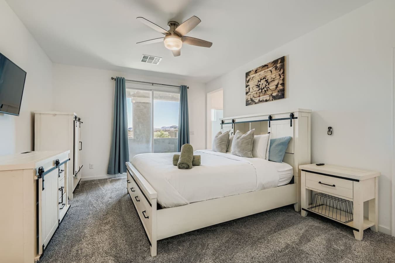 Master bedroom with king size bed.