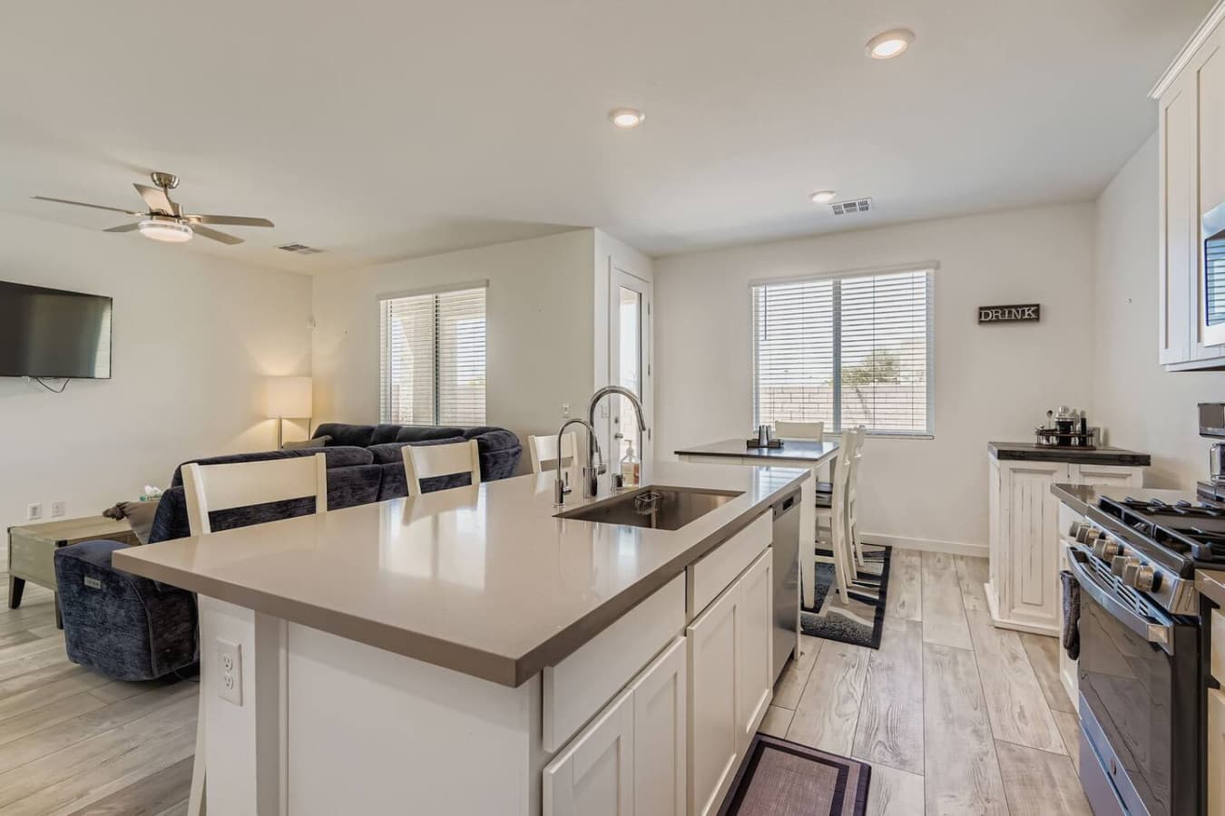 Full kitchen with bar seating.