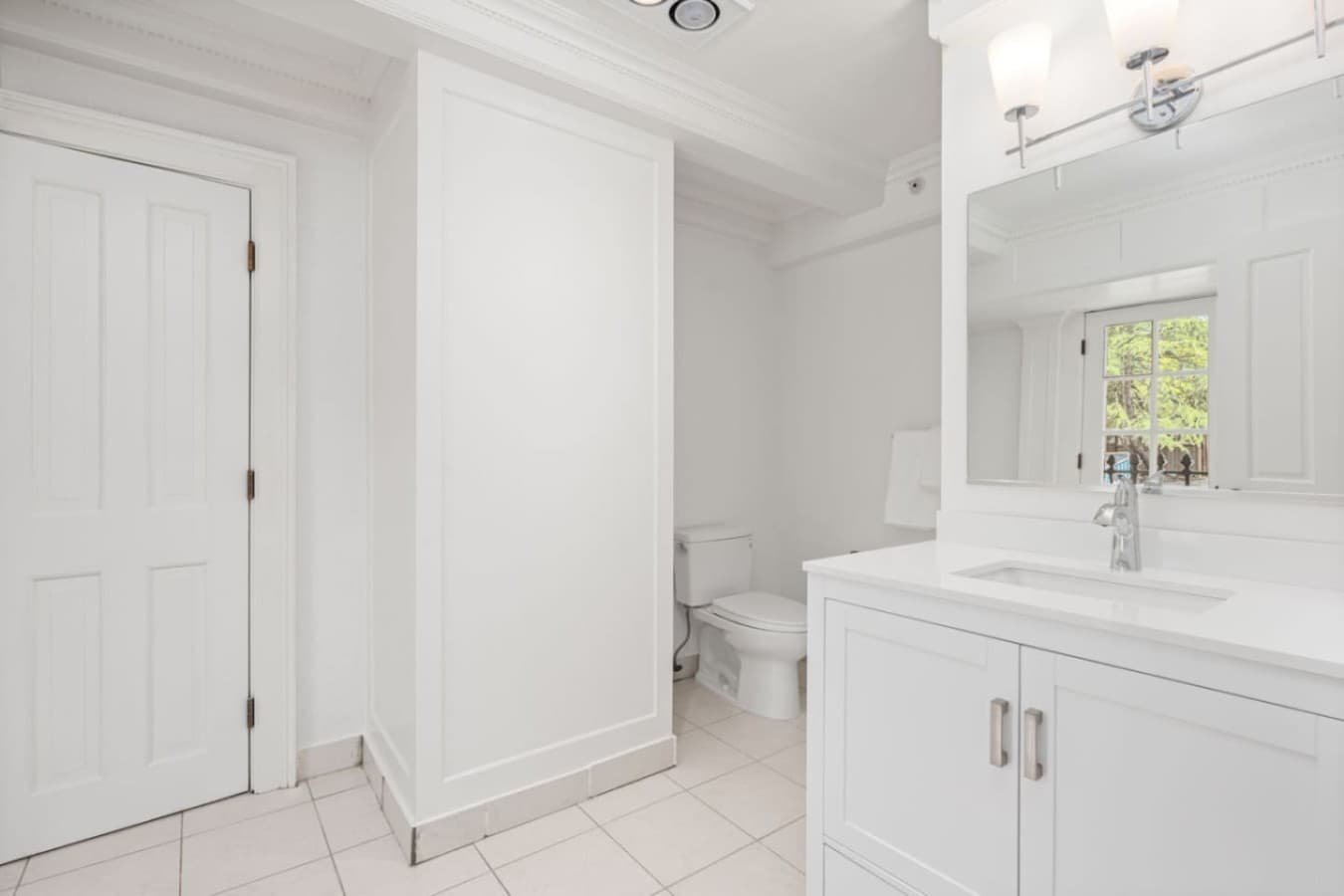 This is the private bathroom inside the room you will be renting offering a spacious layout with a vanity and comfortable amenities.