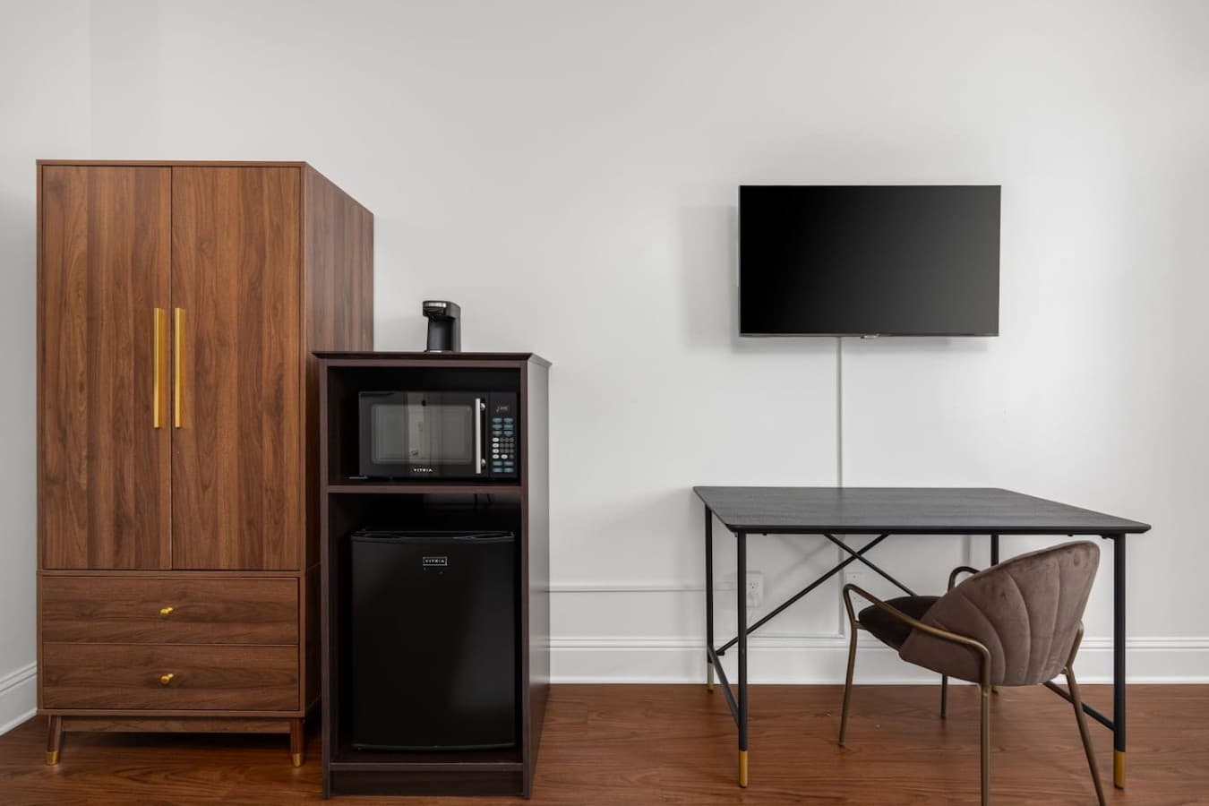 This is the private room you will be renting featuring an in-room microwave, mini fridge, and workspace for added convenience.