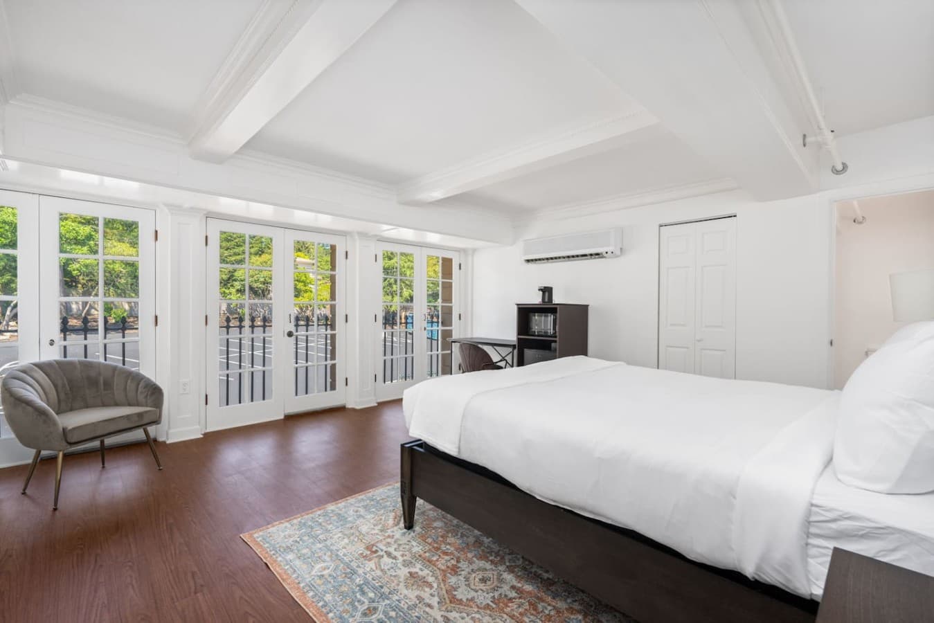 This is the private room you will be renting offering a spacious queen bed and large windows with plenty of natural light.