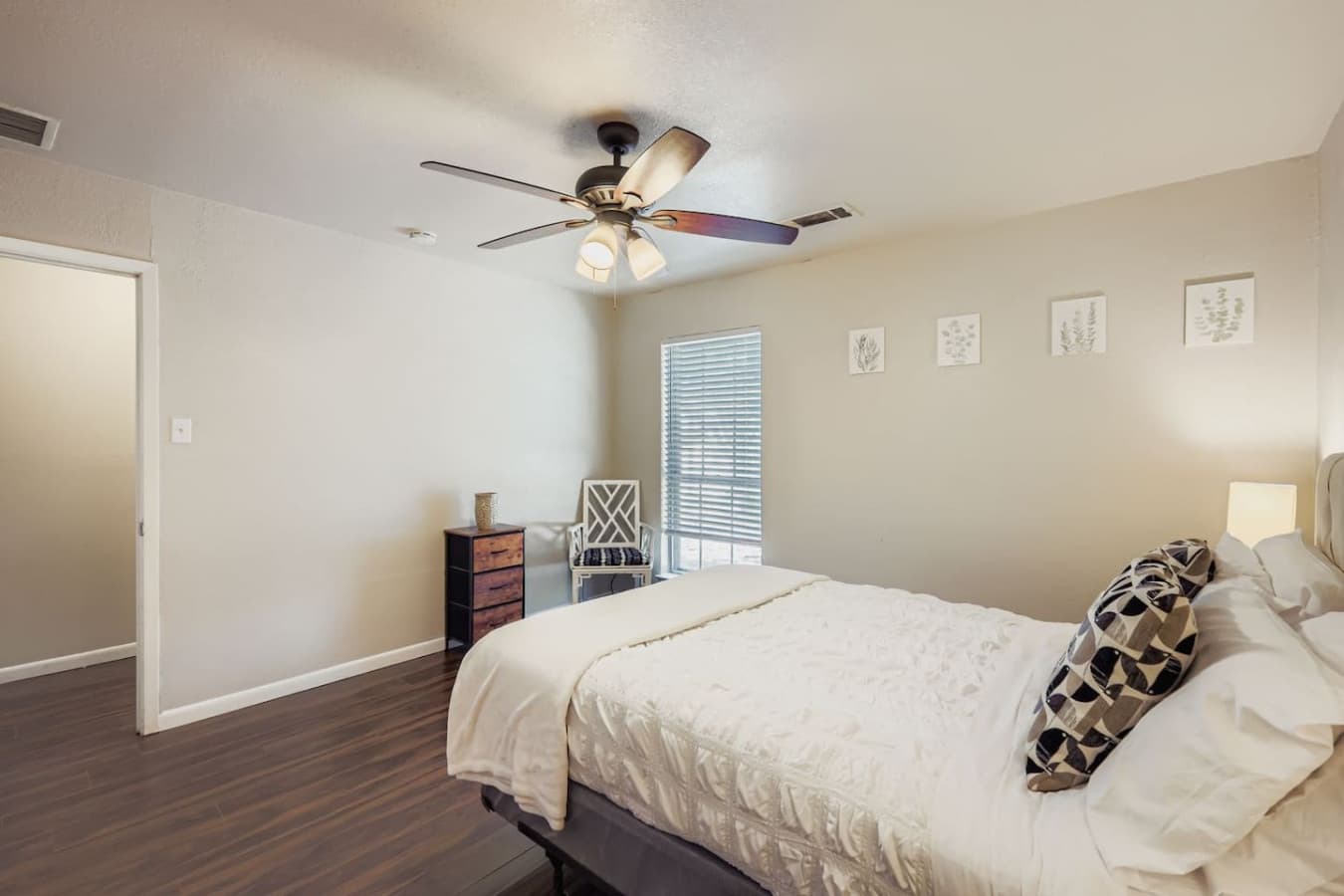 Queen size bed in the master bedroom.