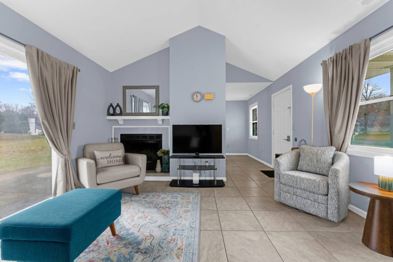 Cozy living room with soft natural light and comfortable seating.