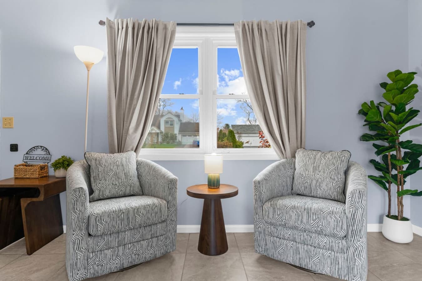 Seating area by the window with soft natural light.