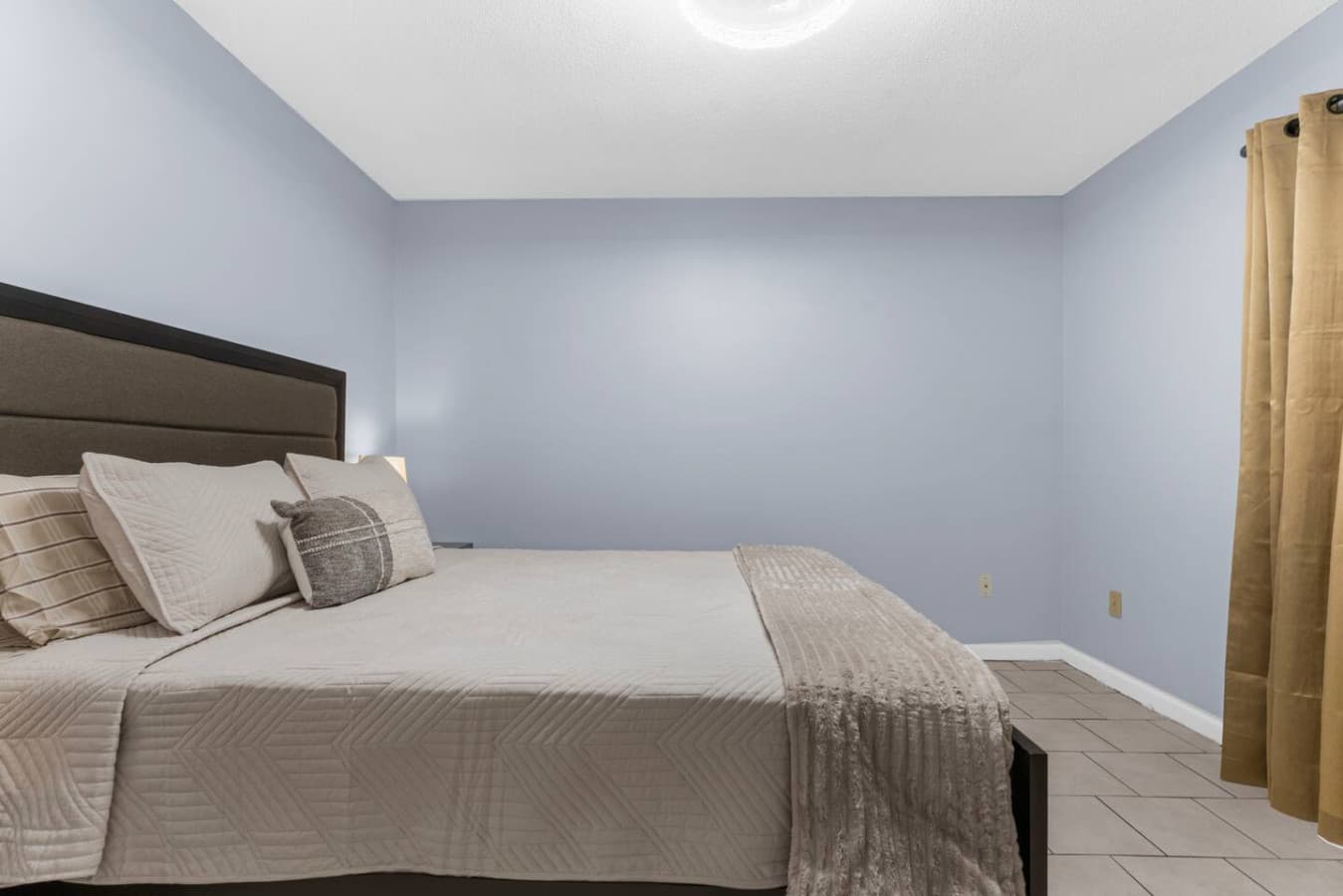 Spacious room with plenty of natural light.