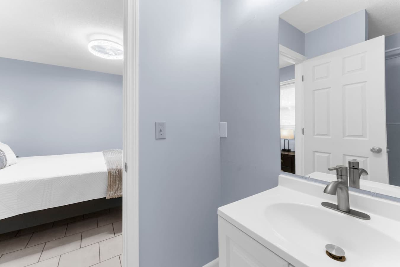 Bright entry into the bathroom with easy access from the bedroom.