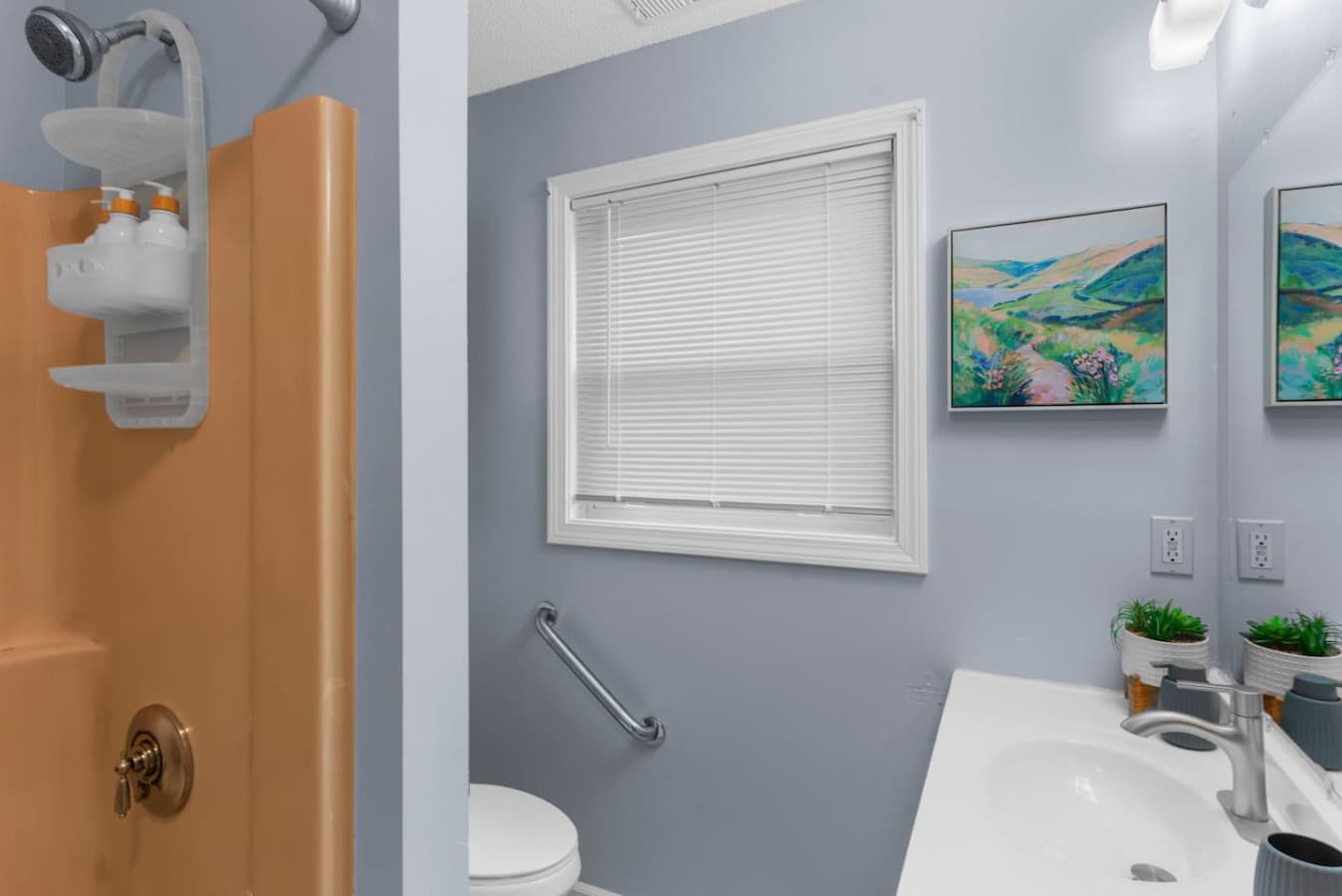 Bright bathroom view with natural light and clean finishes.