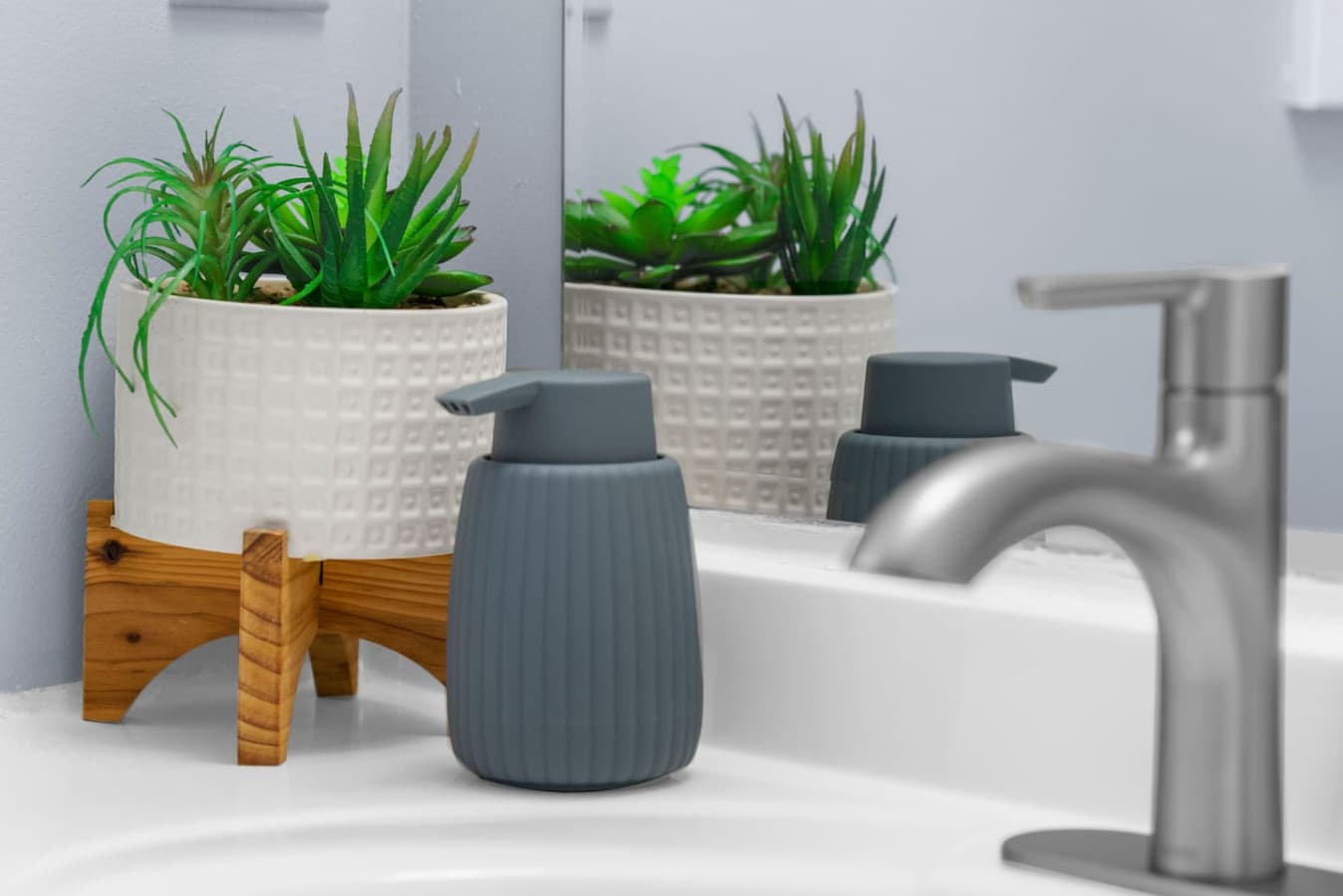 Close view of the countertop accents and greenery.