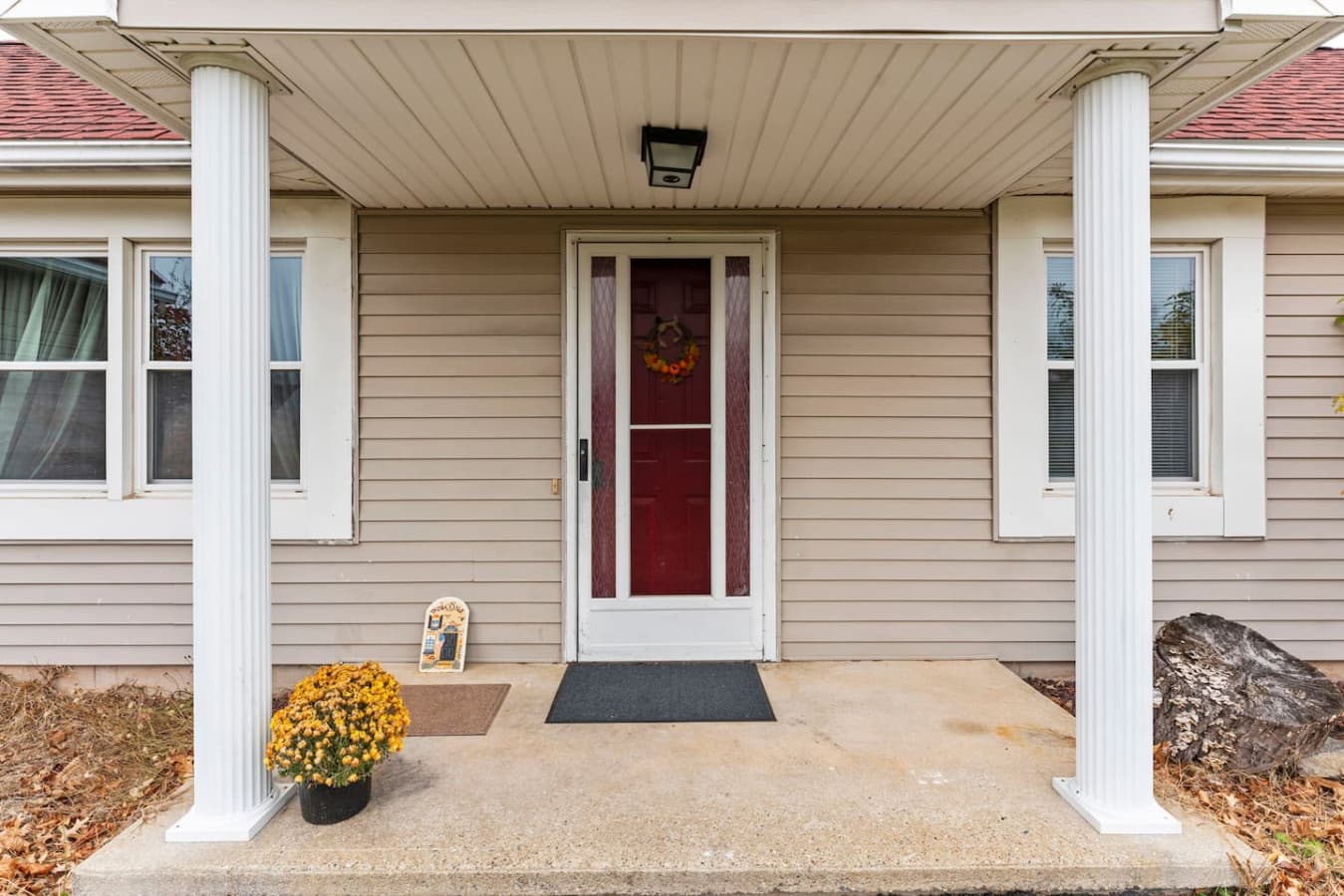 Welcoming front entry with a clean and simple porch.