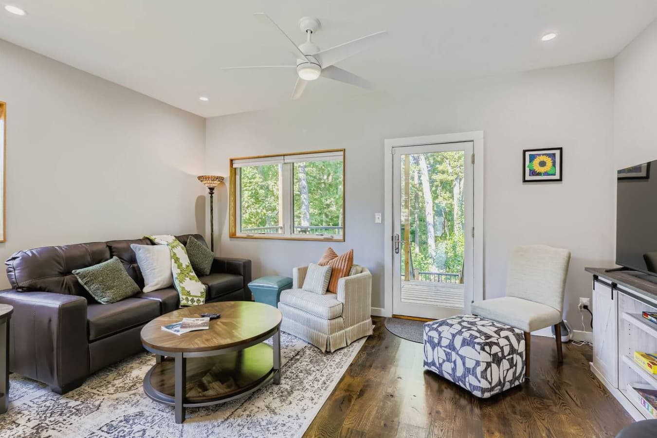 Unit A: Living room space with queen size sofa bed and smart tv.