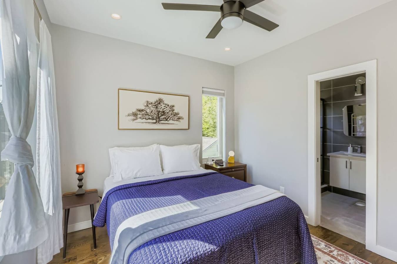Unit A: Queen bed in the master bedroom for comfort.