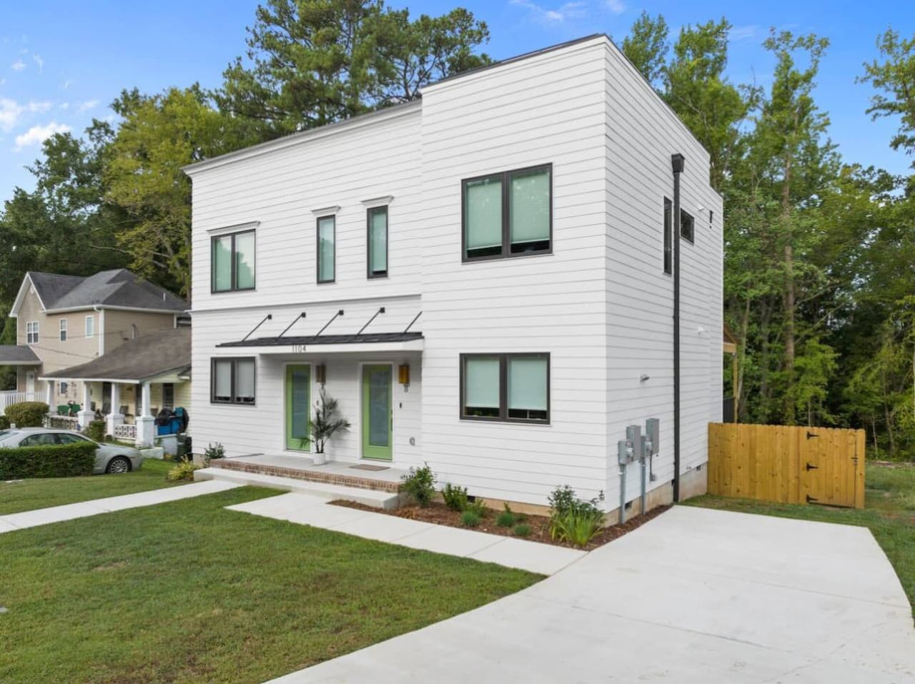 Unit B: Modern duplex with clean, contemporary design and private entrances for each unit. Featuring fresh landscaping, ample driveway parking, and a fenced backyard.