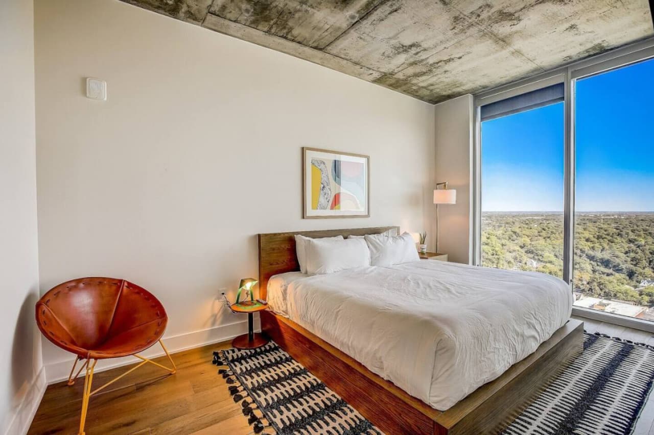 A Serene Bedroom Retreat with a Captivating View