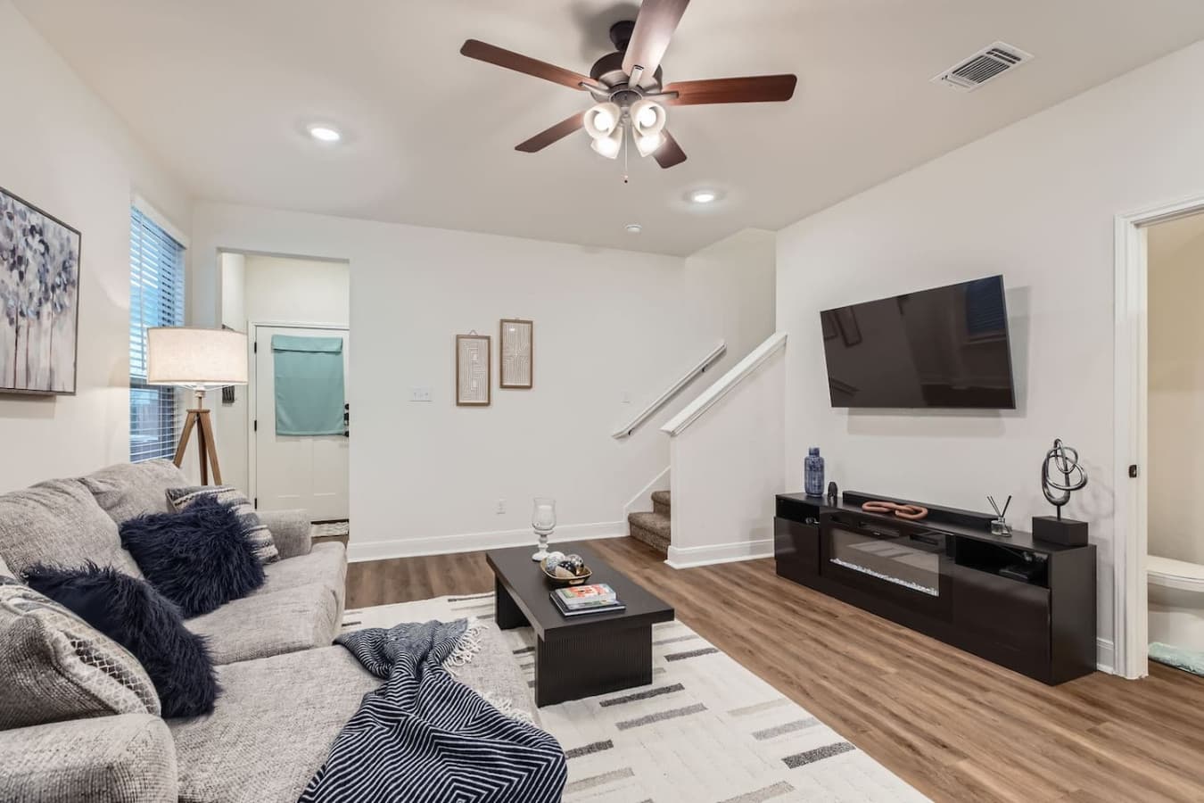 Ready for some downtime?  Our cozy living room is the perfect spot. Catch a movie on the Smart TV or enjoy the warmth of the electric fireplace – entertainment and relaxation await.