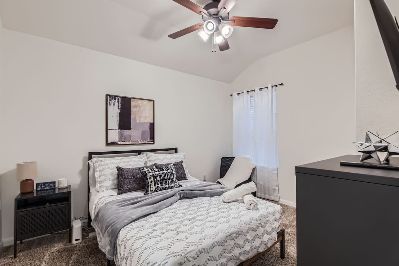Full size bed featured in the second bedroom.