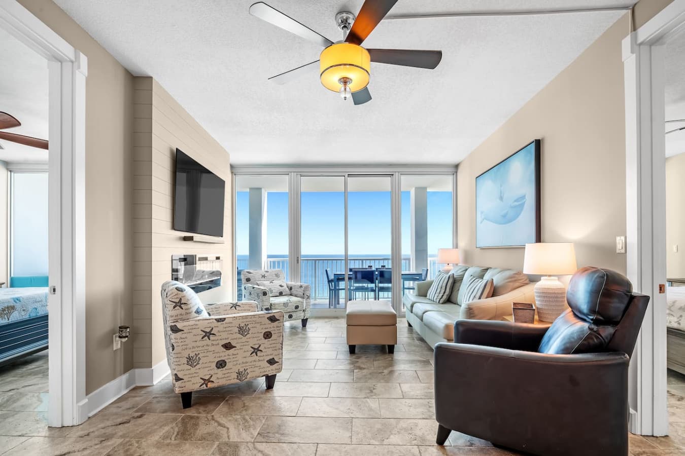 A stylish living room, flat screen entertainment, and an unbeatable beach view.