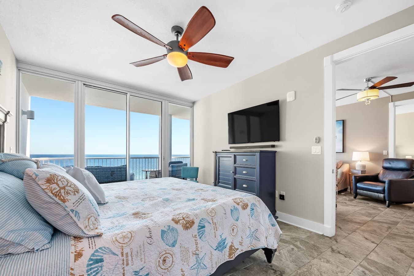 Sleep in luxury with a king-size bed and balcony views.
