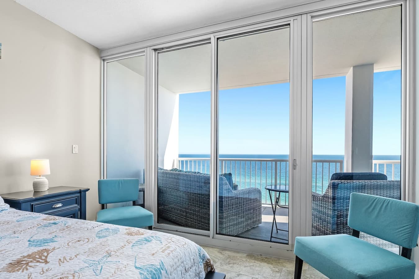 Cozy king-size bed and beautiful balcony views.