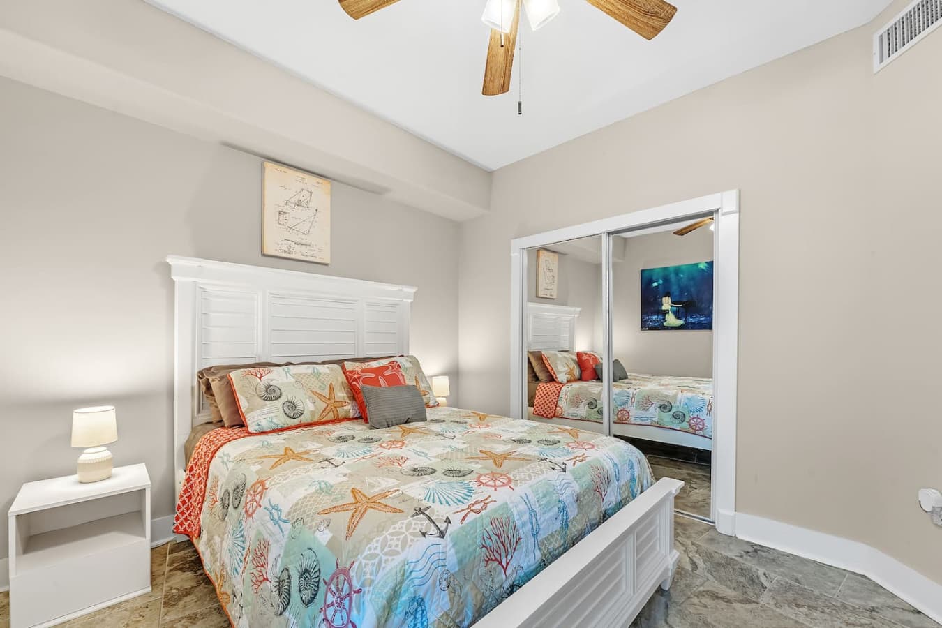Third bedroom comfort: queen-size bed and TV for your convenience.