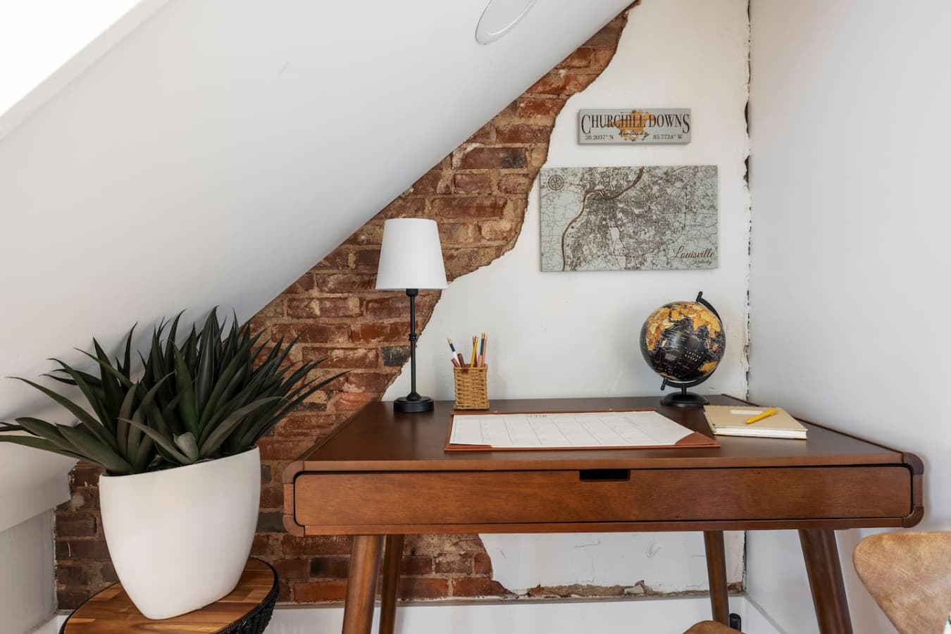 Dedicated workspace nestled in the corner.
